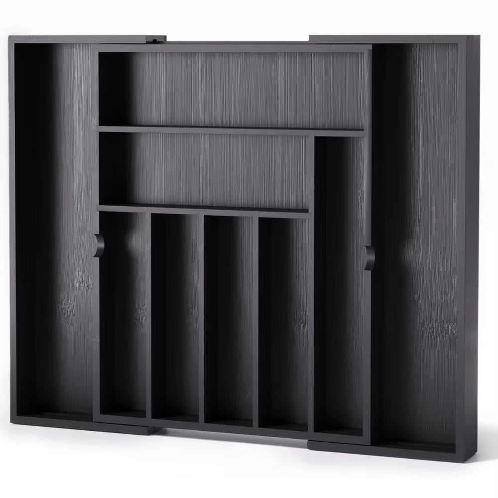 Black expandable drawer organizer tray with multiple compartments for cutlery and kitchen utensils, shown empty.
