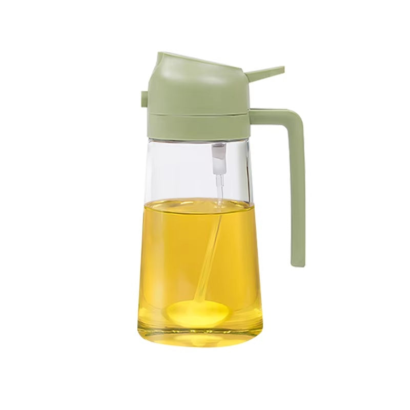 green 2-in-1 olive oil sprayer and dispenser bottle with ergonomic handle and transparent glass container for healthy cooking