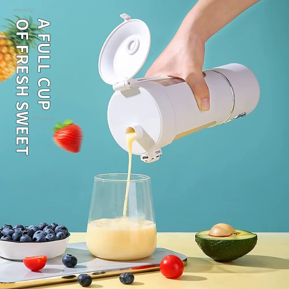 Portable blender bottle pouring fresh fruit smoothie into a glass with easy-open drinking lid and travel-friendly design.
