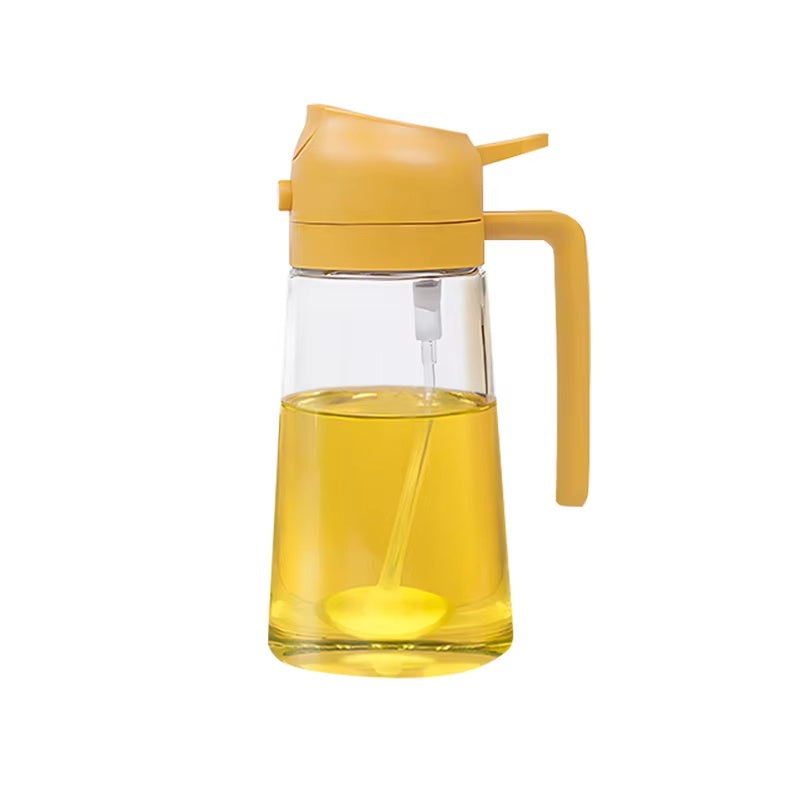 yellow 2-in-1 olive oil sprayer and dispenser bottle with ergonomic handle and transparent glass container for kitchen cooking